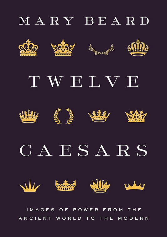 Hardcover of 'Twelve Caesars' by Mary Beard with gold crowns and laurels on a black background.